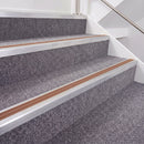 Mill Finish double insert chevron stair nosing, 40mm riser with Mid Brown inserts, fitted on carpeted stairs