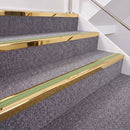 Mirrorflect Gold double insert chevron stair nosing, 40mm riser with Apple Green inserts, fitted on carpeted stairs