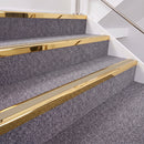 Mirrorflect Gold double insert chevron stair nosing, 40mm riser with Beige inserts, fitted on carpeted stairs