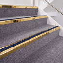 Mirrorflect Gold double insert chevron stair nosing, 40mm riser with Dark Blue inserts, fitted on carpeted stairs