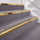 Mirrorflect Gold double insert chevron stair nosing, 40mm riser with Mid Grey inserts, fitted on carpeted stairs