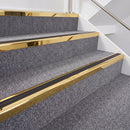 Mirrorflect Gold double insert chevron stair nosing, 40mm riser with Premium Black inserts, fitted on carpeted stairs