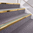 Mirrorflect Gold double insert chevron stair nosing, 40mm riser with Sage Green inserts, fitted on carpeted stairs