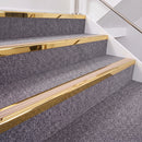 Mirrorflect Gold double insert chevron stair nosing, 40mm riser with Sahara inserts, fitted on carpeted stairs