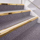 Mirrorflect Gold double insert chevron stair nosing, 40mm riser with White inserts, fitted on carpeted stairs
