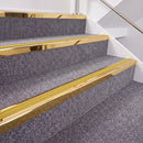 Mirrorflect Gold double insert chevron stair nosing, 40mm riser with Yellow inserts, fitted on carpeted stairs