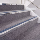 Mirrorflect Silver double insert chevron stair nosing, 40mm riser with Blue inserts, fitted on carpeted stairs