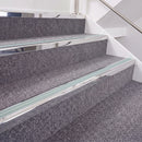 Mirrorflect Silver double insert chevron stair nosing, 40mm riser with Sage Green inserts, fitted on carpeted stairs
