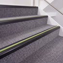 Satin Black double insert chevron stair nosing, 40mm riser with Apple Green inserts, fitted on carpeted stairs