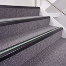 Satin Black double insert chevron stair nosing, 40mm riser with Sage Green inserts, fitted on carpeted stairs