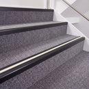 Satin Black double insert chevron stair nosing, 40mm riser with White inserts, fitted on carpeted stairs