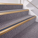 Satin Bronze double insert chevron stair nosing, 40mm riser with Blue inserts, fitted on carpeted stairs