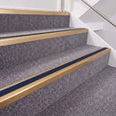 Satin Bronze double insert chevron stair nosing, 40mm riser with Dark Blue inserts, fitted on carpeted stairs