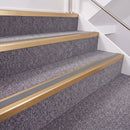 Satin Bronze double insert chevron stair nosing, 40mm riser with Mid Grey inserts, fitted on carpeted stairs