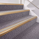 Satin Bronze double insert chevron stair nosing, 40mm riser with Oyster inserts, fitted on carpeted stairs