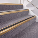 Satin Bronze double insert chevron stair nosing, 40mm riser with Premium Black inserts, fitted on carpeted stairs