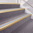 Satin Gold double insert chevron stair nosing, 40mm riser with Aura inserts, fitted on carpeted stairs