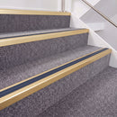 Satin Gold double insert chevron stair nosing, 40mm riser with Blue inserts, fitted on carpeted stairs
