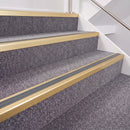 Satin Gold double insert chevron stair nosing, 40mm riser with Mid Grey inserts, fitted on carpeted stairs