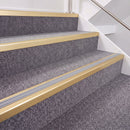 Satin Gold double insert chevron stair nosing, 40mm riser with Polar Grey inserts, fitted on carpeted stairs