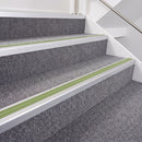 Satin Silver double insert chevron stair nosing, 40mm riser with Apple Green inserts, fitted on carpeted stairs