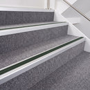 Satin Silver double insert chevron stair nosing, 40mm riser with Dark Green inserts, fitted on carpeted stairs