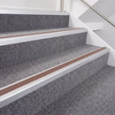 Satin Silver double insert chevron stair nosing, 40mm riser with Mid Brown inserts, fitted on carpeted stairs