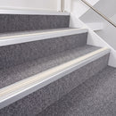 Satin Silver double insert chevron stair nosing, 40mm riser with White inserts, fitted on carpeted stairs