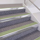 Bright Polished double insert chevron stair nosing, 60mm riser with Apple Green inserts, fitted on carpeted stairs