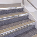 Bright Polished double insert chevron stair nosing, 60mm riser with Beige inserts, fitted on carpeted stairs