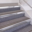 Bright Polished double insert chevron stair nosing, 60mm riser with Brown inserts, fitted on carpeted stairs