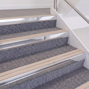 Bright Polished double insert chevron stair nosing, 60mm riser with Sahara inserts, fitted on carpeted stairs