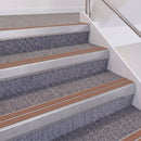 Mill Finish double insert chevron stair nosing, 60mm riser with Mid Brown inserts, fitted on carpeted stairs