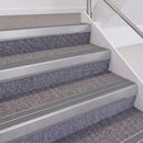 Mill Finish double insert chevron stair nosing, 60mm riser with Mid Grey inserts, fitted on carpeted stairs