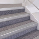 Mill Finish double insert chevron stair nosing, 60mm riser with Polar Grey inserts, fitted on carpeted stairs