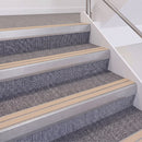 Mill Finish double insert chevron stair nosing, 60mm riser with Sahara inserts, fitted on carpeted stairs