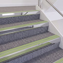 Mirrorflect Silver double insert chevron stair nosing, 60mm riser with Apple Green inserts, fitted on carpeted stairs