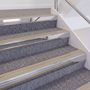 Mirrorflect Silver double insert chevron stair nosing, 60mm riser with Beige inserts, fitted on carpeted stairs