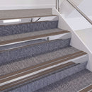 Mirrorflect Silver double insert chevron stair nosing, 60mm riser with Brown inserts, fitted on carpeted stairs