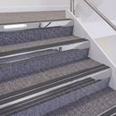Mirrorflect Silver double insert chevron stair nosing, 60mm riser with Dark Grey inserts, fitted on carpeted stairs