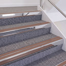 Mirrorflect Silver double insert chevron stair nosing, 60mm riser with Mid Brown inserts, fitted on carpeted stairs