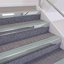 Mirrorflect Silver double insert chevron stair nosing, 60mm riser with Sage Green inserts, fitted on carpeted stairs