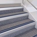 Satin Silver double insert chevron stair nosing, 60mm riser with Blue inserts, fitted on carpeted stairs