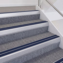 Satin Silver double insert chevron stair nosing, 60mm riser with Dark Blue inserts, fitted on carpeted stairs