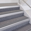 Satin Silver double insert chevron stair nosing, 60mm riser with Mid Grey inserts, fitted on carpeted stairs