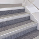 Satin Silver double insert chevron stair nosing, 60mm riser with Oyster inserts, fitted on carpeted stairs
