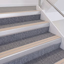 Satin Silver double insert chevron stair nosing, 60mm riser with Sahara inserts, fitted on carpeted stairs