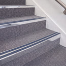 Bright Polished double insert chevron stair nosing, 70mm riser with Blue inserts, fitted on carpeted stairs