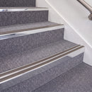 Bright Polished double insert chevron stair nosing, 70mm riser with Brown inserts, fitted on carpeted stairs