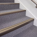 Dark Bronze double insert chevron stair nosing, 70mm riser with Beige inserts, fitted on carpeted stairs